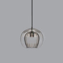 Glass globe pendant light over the island pendant lights